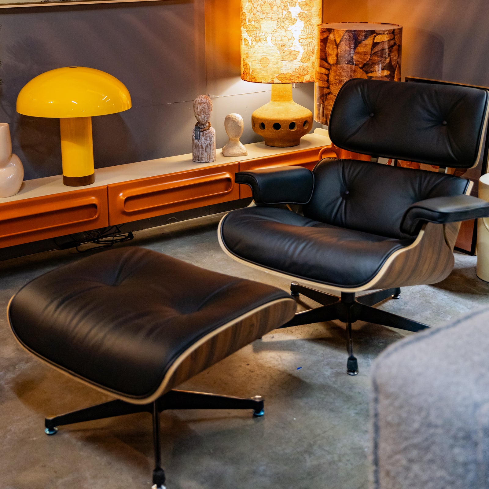 Iconic Lounge Chair and Ottoman - Walnut & Black Leather