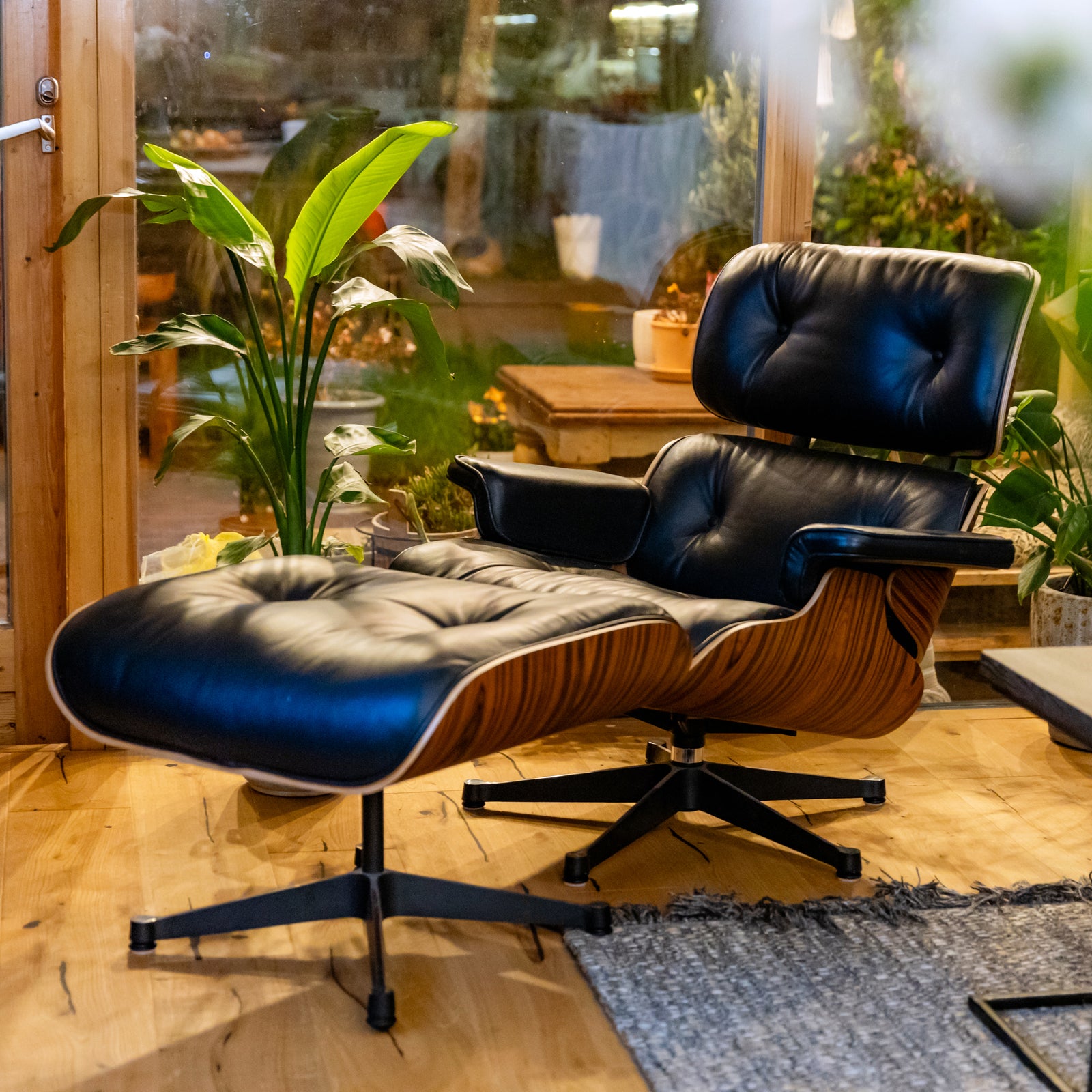 Iconic Lounge Chair and Ottoman - Rosewood & Black Leather