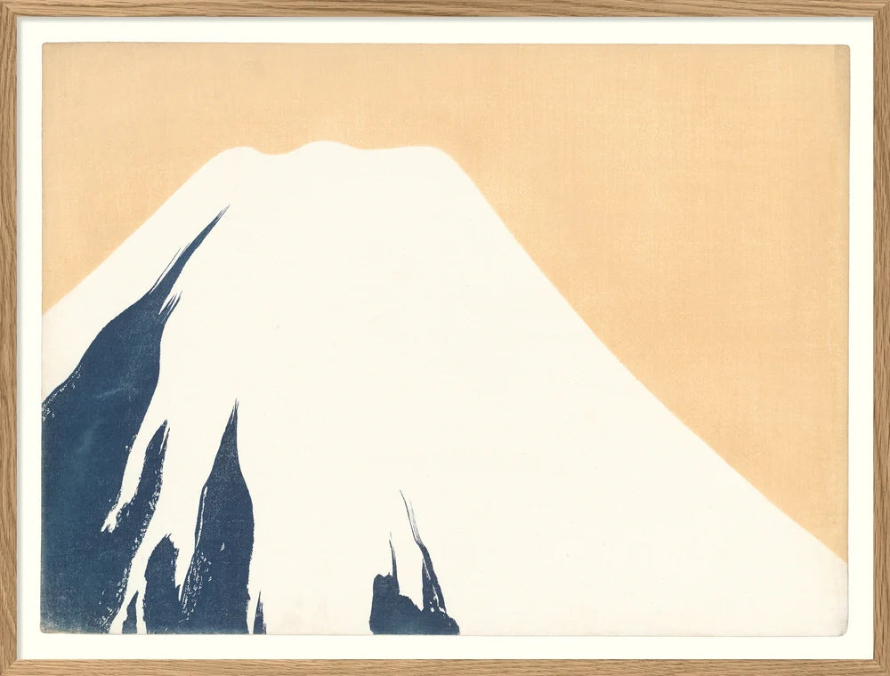 Framed artwork of a mountain silhouette on a beige background