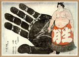 A framed Japanese-style art print depicting a large black hand with white calloused fingertips beside a sumo wrestler wearing an orange-red mawashi with large white characters, on an off-white background.