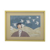 Framed artwork of a person with birds and waves on a blue background
