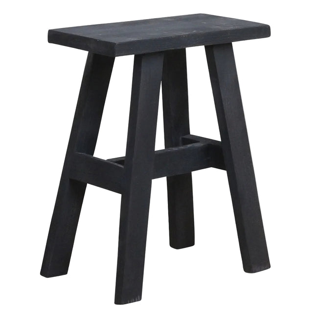 A rustic black wooden stool with a square seat and four angled legs connected by a lower crossbar, shown on a plain white background.