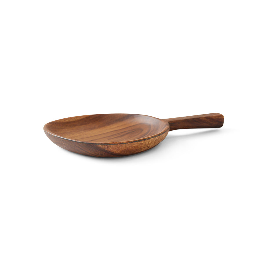 Wooden serving spoon on a white background