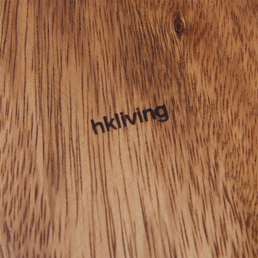 Wooden surface with 'hkliving' branding