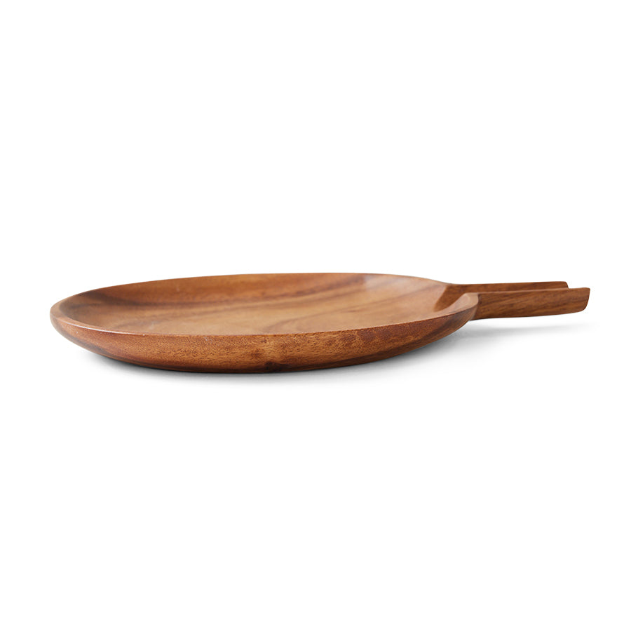 Wooden plate with handle on a white background