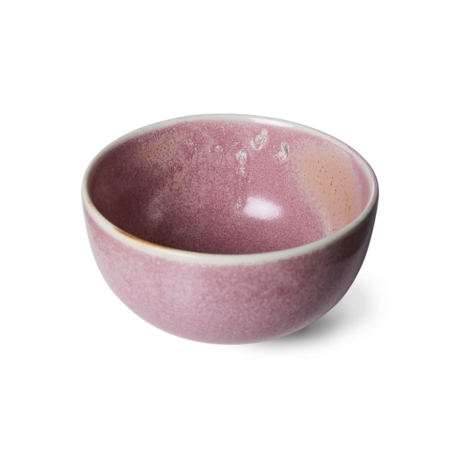 Pink ceramic bowl on a white background