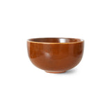 Brown ceramic bowl on a white background