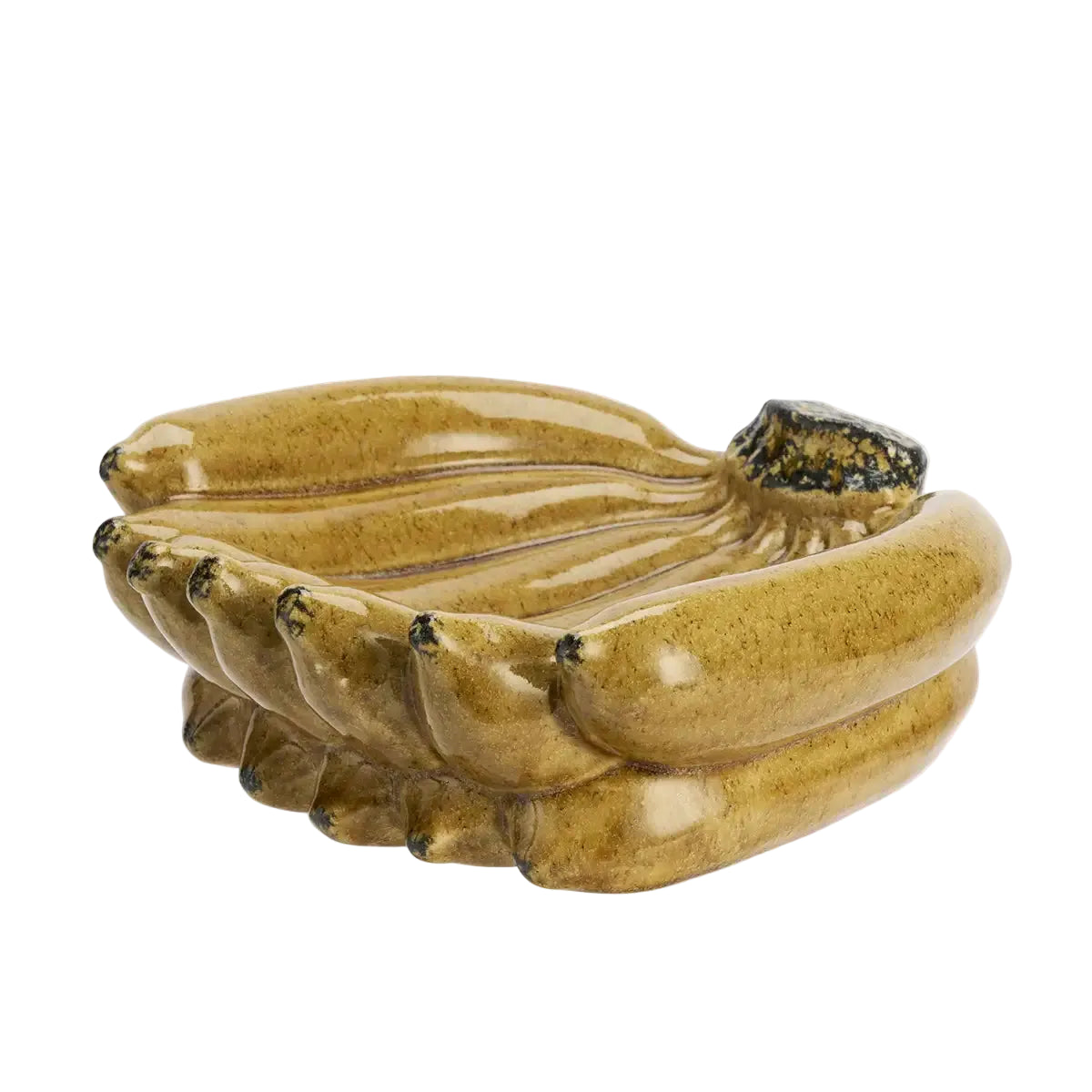 A ceramic decorative figurine shaped like a bunch of bananas, featuring a glossy mustard-yellow and brown glaze with dark speckled accents on the stem and tips, set against a plain light gray background.