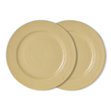 Two round ceramic plates in a light sandy beige color, overlapping on a clean white background.