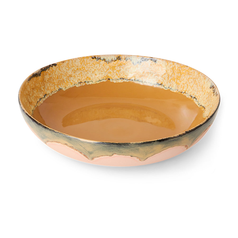 Ceramic bowl with a textured edge on a white background