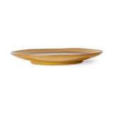Yellow ceramic plate on a white background