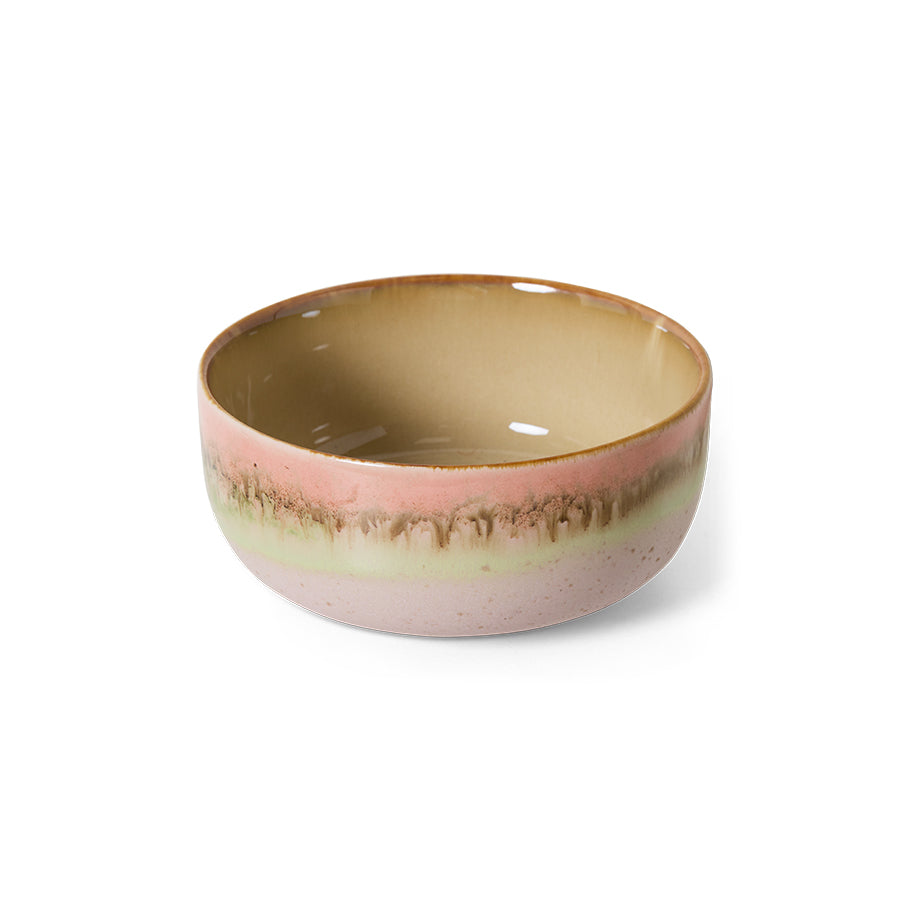 Ceramic bowl with a gradient color design on a white background