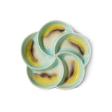 Ceramic dish with banana design on a white background